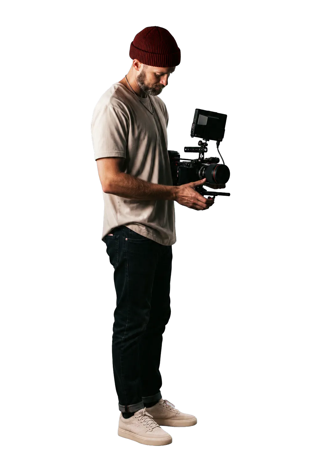 Videographer holding a professional cinema camera rig